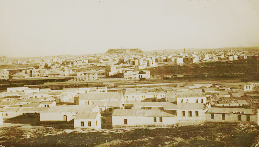 In the foreground is the Syriac Quarter in Aleppo, Syria with the citadel in the background